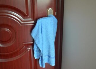 Why Do People Hang Towels on Door Handles in Hotels? This Hack is Genius.