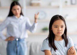 Two Sentences Parents Should Never Utter to Their Children, According to a Psychologist