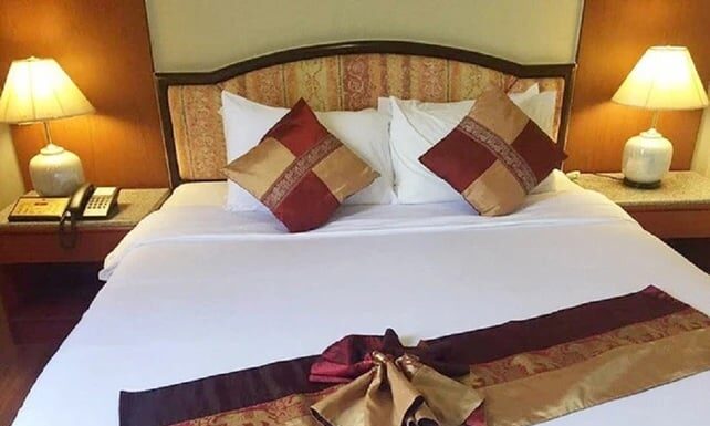 What’s the Purpose of Those Extra Two Pillows in Hotel Beds?