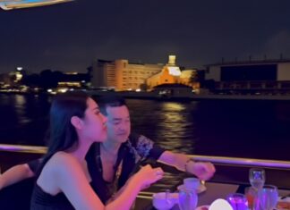 “A Romantic Evening: Quang Minh and His Beloved Enjoy an Extravagant Dinner on a Yacht, Sealing the Night with a Passionate Kiss”