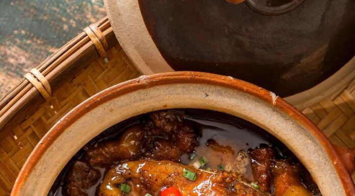 “The Ultimate Guide to Cooking Fish in a Rice Cooker: A Delicate Dish with a Tangy Twist”