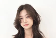 “Achieve a V-Line Face with This Flattering Bangs Hairstyle: Naturally Conceal Imperfections for a Stunning Look”