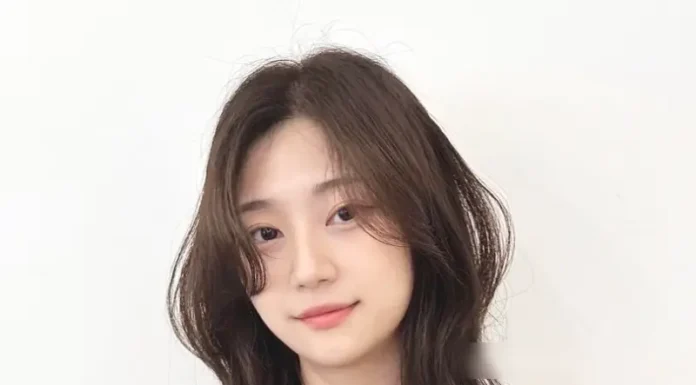 “Achieve a V-Line Face with This Flattering Bangs Hairstyle: Naturally Conceal Imperfections for a Stunning Look”